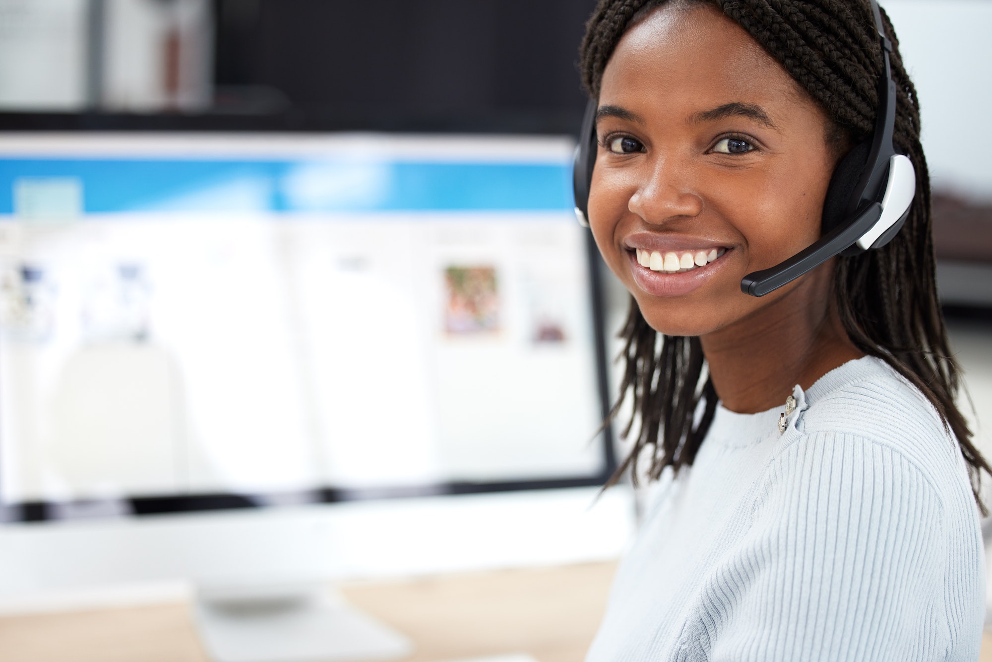 Call center, customer support and portrait of black woman with computer in office. Contact us, crm